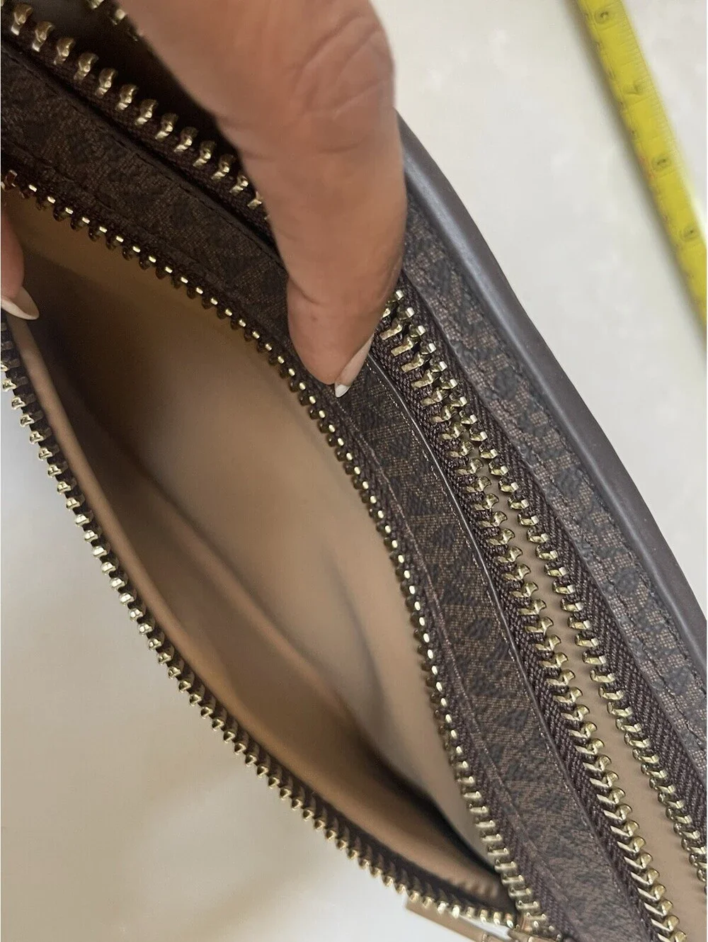Michael Kors Logo Double-Zip Fanny Pack in brown with gold-tone hardware